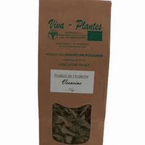 Paquet en papier brun Verveine, fenêtre montrant feuilles séchées, emballage tisane plante naturelle.