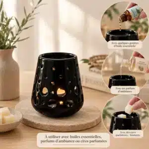 Brûleur à huiles en céramique noire allumé, huiles essentielles, cubes de cire, parfum à côté.